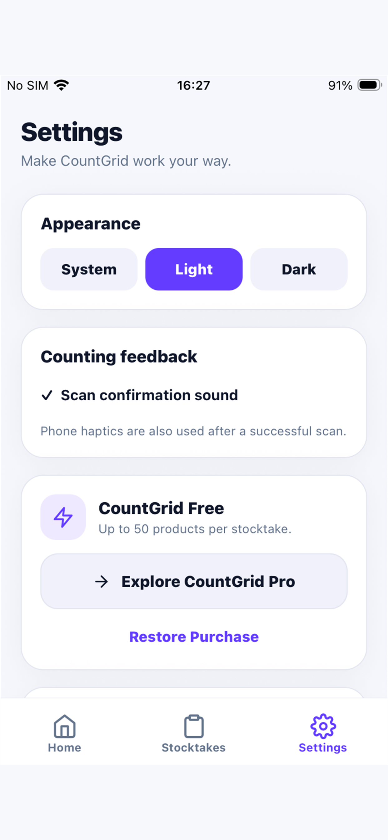 CountGrid settings showing the Free tier and restore purchase control.